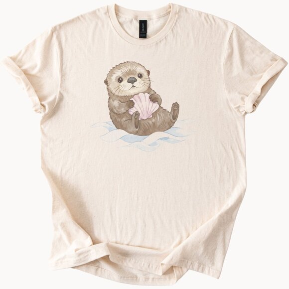 Adorable Otter Holding Seashell Graphic Tee Cute Ocean Animal Shirt Gift - Picture 1 of 6
